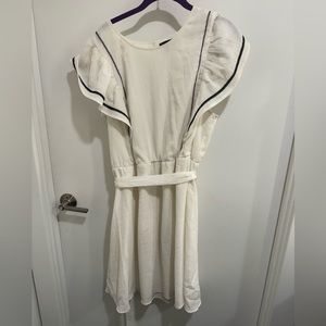 White Dress with black details.